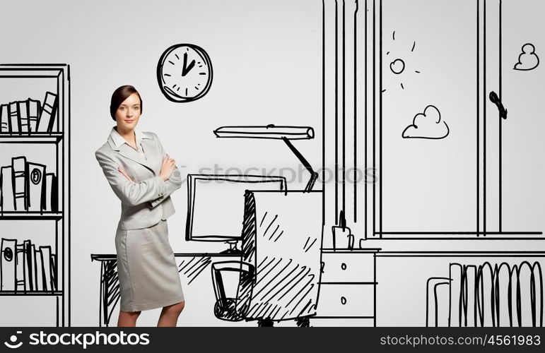 Office worker. Young confident businesswoman standing in drawn office