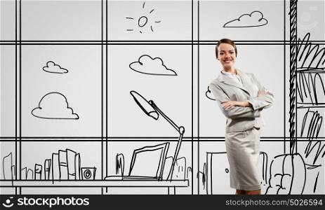 Office worker. Young confident businesswoman standing in drawn office