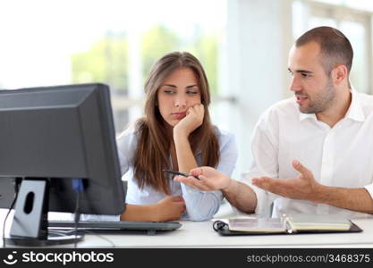 Office workers arguing on project