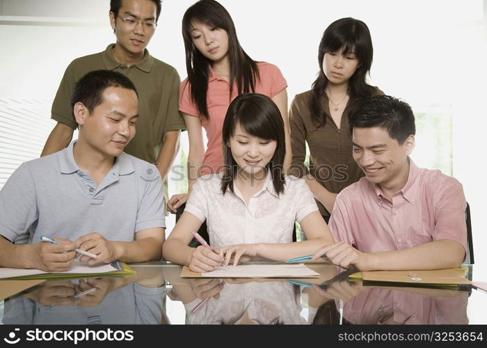 Office workers discussing in meeting