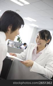 Office workers enjoy talking each other