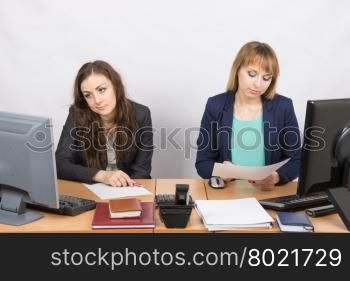Office Workers of despondently sitting at a desk