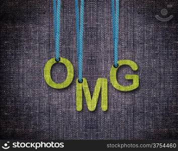 Oh my Gud, OMG Letters hanging strings with blue sackcloth background.