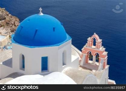 Oia. Greek church.. Traditional small white church in Oia on Santorini. Greece.