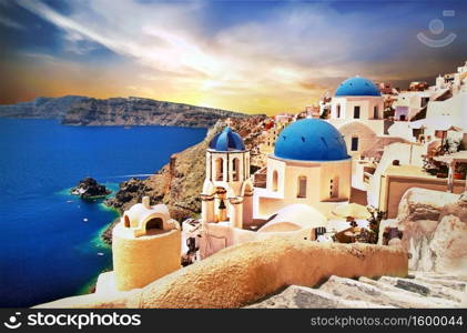 Oia village over sunset. Iconic island Santorini. Greece