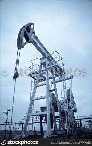 Oil and gas industry. Pump jack. Monochrome.