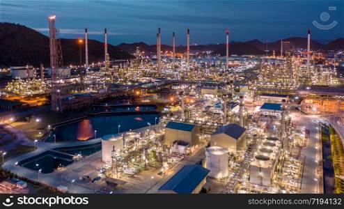 oil and gas refinery industry for transport and export of Thailand aerial view at night shot from drone