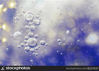 Oil bubbles close up. a circles of water macro. abstract light blue background. Oil bubbles close up. circles of water macro. abstract light blue background