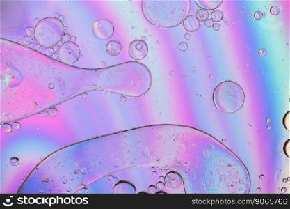 Oil drops in water. Holographic abstract background in pastel neon color. Abstract background with colorful gradient colors. DOF. Holographic abstract background in pastel neon color picture made with oil, water and soap