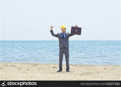 Oil engineer on sea side beach