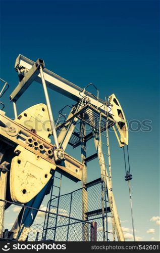 Oil pumpjack, industrial equipment. Rocking machines for power generation. Extraction of oil. Petroleum concept.. Oil pumpjack, industrial equipment. Rocking machines for power generation. Extraction of oil.