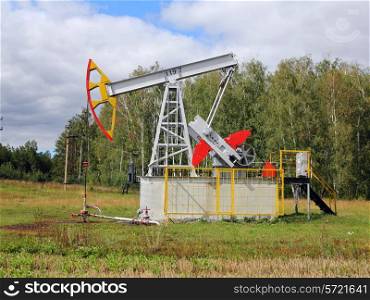 Oil pumpjack. Oil industry equipment.