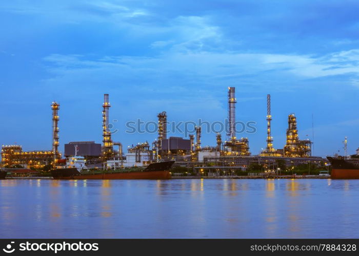 Oil refinery at twilight, business logistic concept