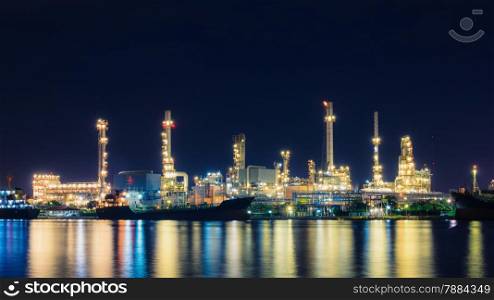 Oil refinery at twilight, business logistic concept