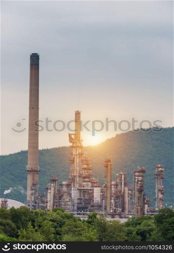 Oil Refinery factory Petroleum in sunset at twilight, petrochemical plant