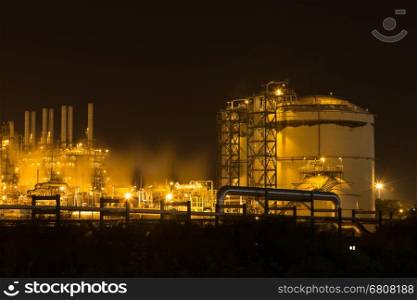 Oil refinery industrial plant at night, Thailand