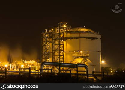 Oil refinery industrial plant at night, Thailand