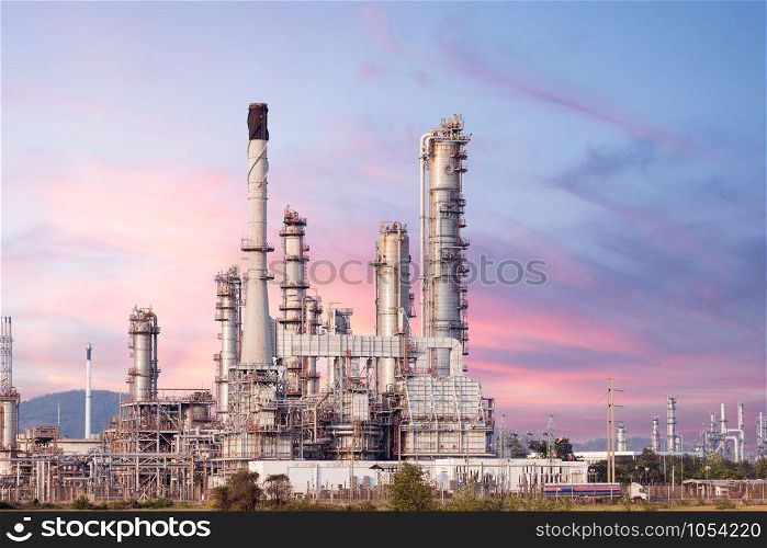 Oil refinery industry plant twilight at sunset