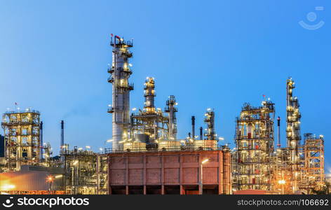 Oil refinery plant and storage tank in the morning