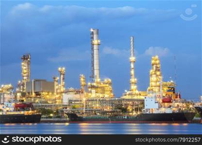 oil refinery plant beside river and ship port