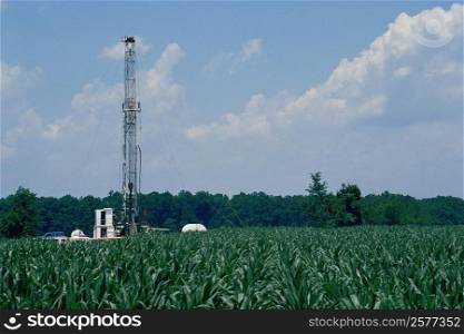 Oil rig in agricultural field