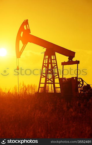 oil rig on the plains, selective focus on nearest