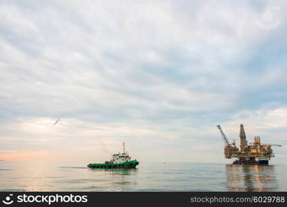 Oil rig platform in the calm sea