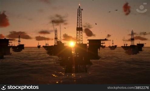 Oil rigs in ocean, timelapse sunset