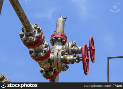 Oil well wellhead equipment. Hand valve with handwheel for opening and closing the flow line. Oil well wellhead equipment. Hand valve with handwheel for opening and closing the flow line.