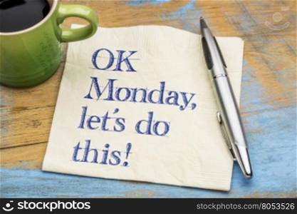 OK Monday, let&rsquo;s do this! - handwriting on a napkin with a cup of espresso coffee