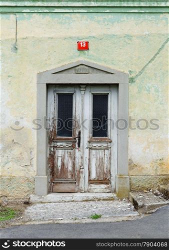 Old 1910 year house door with number 13