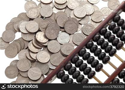 Old abacus with coins on white background