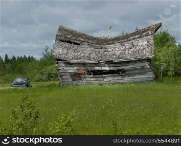 Old abandoned barn in a field, Manitoba, Canada