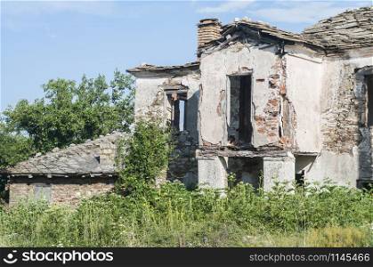 Old abandoned broken decayed rural country house