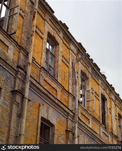 Old abandoned building wall with cloudy sky. Kiev, Ukraine