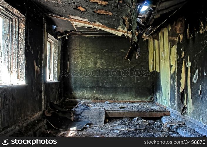 old abandoned burned-out house inside hdr