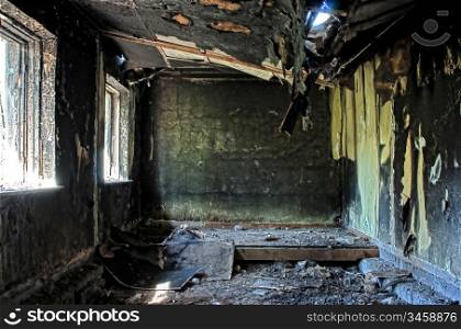 old abandoned burned-out house inside hdr