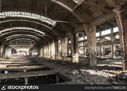 Old abandoned decayed grunge hall of vintage railway plant