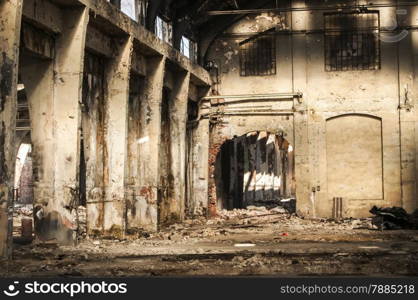 Old abandoned decayed grunge hall of vintage railway plant inside