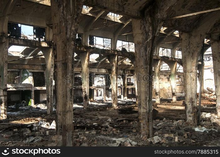 Old abandoned decayed grunge hall of vintage railway plant inside