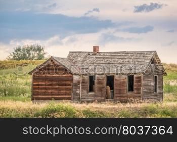old abandoned farmhouse on a prairie, St Vrain State Park near Longmont, Colorado