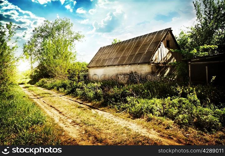 Old abandoned house in a village near the road
