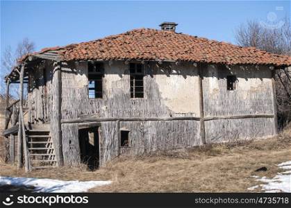 Old abandoned outbuilding for rearing animals in mountain