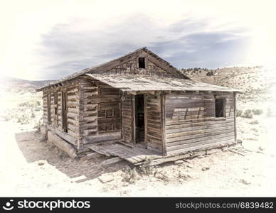 old abandoned school house in western Colorado, image processed as hand tinted opalotype