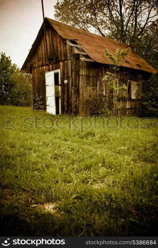 Old abandones lonely house near the forest