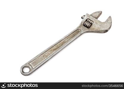 Old adjustable spanner isolated on white background
