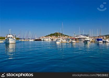 Old adriatic village of Tribunj harbor blue summer view, Dalmatia, Croatia