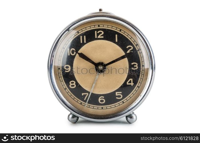 Old alarm clock isolated on white background