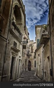 Old alley in the old town of Lecce in the southern of Italy