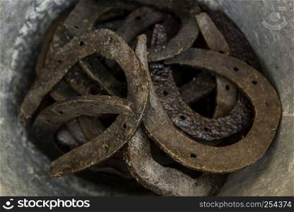 Old and rusty horseshoes for horses, object detail for animals